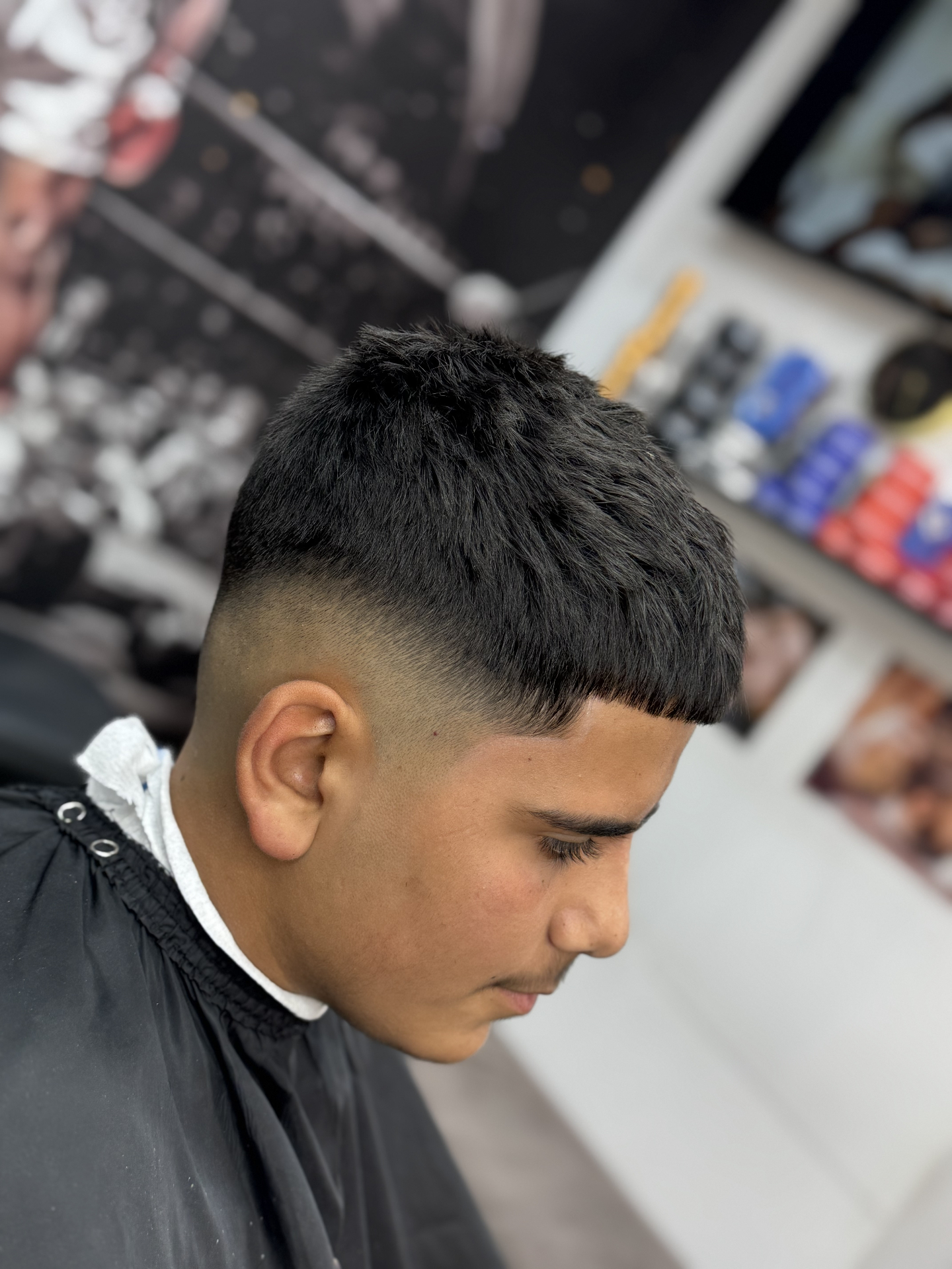 Textured crop haircut styled by A Star Fades